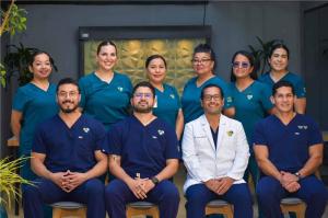 Carlos Bautista with patients at Immunity Therapy Center