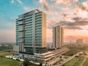 ONE Atmosphere Suites Corner Walk Gurugram 1