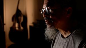 Tarik Shah with bass in background