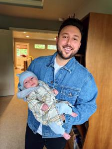 Alex Rossman with his new son Rome