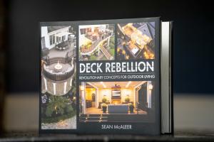 Cover of the book Deck Rebellion: Revolutionary Concepts for Outdoor Living by Sean McAleer, featuring multiple outdoor living project images