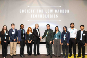 Dr. Sarah Morgan of Lone Star College–CyFair and SFLCT Chairman Fernando C. Hernandez (pictured in the middle) formalize the 2026 Sustainability Day Summit partnership, with student integration