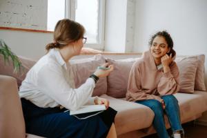 Therapist speaking with patient during outpatient mental health counseling session