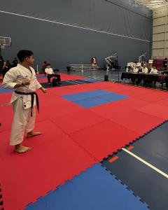 Eli Cooper delivers a high-scoring kata performance during competition in Montreal.