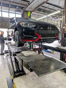 Jeff Boeckel - Owner of Dee Pats Awsomotive in his Selden Auto Repair Shop