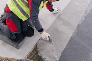 craftsman troweling terrazzo 