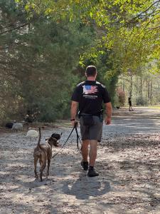 dog walking at Canine Revolution Dog Training's private training academy