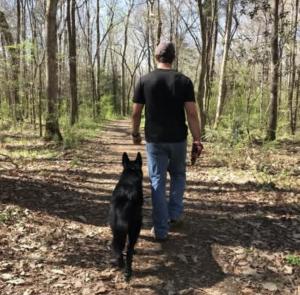Canine Revolution Dog Training Professional Dog Trainer Chad Singer and a 6-week Off-Leash Freedom Student on a hiking trail