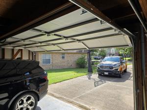 Professional installation of a smart garage door opener with WiFi in Houston 77005.