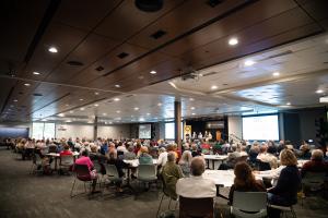 CD_SLCL Wide shot audience and panel