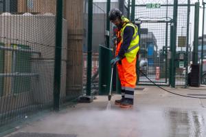 Pressure washing floor
