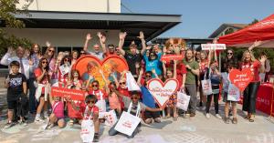 Boys & Girls Club of Ada County - Meridian Unit celebrate in front of their Heart Installation during the CBH Hearts Across the Valley unveiling event.