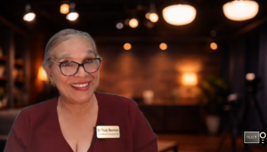 Dr Trudy Beerman hosting a television interview segment