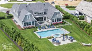 Custom Island Homes Custom-Built Family Estate with Private Pool and Outdoor Living Area