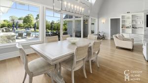 Custom Island Homes Light-Filled Interior with Seamless Indoor-Outdoor Living Design