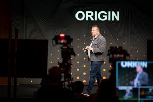 In an era where digital engagement is measured in seconds, the demand for vertical, snackable content has fundamentally reshaped the corporate landscape corporate event speaker on stage presentation professional lighting photography