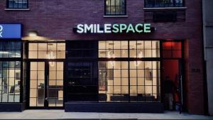 Smile brick sign