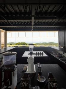 Coffee omakase table setup at Spirit Origin in Roatan, Honduras with ocean view and specialty coffee service