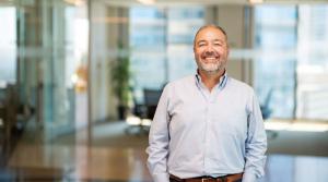 Walter Silva, Head of Innovation at Titlespace, in a modern office environment