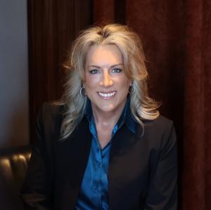 Headshot of Stacy Winsett, author of From Ashes to Influence: Leadership Forged by Fire and Faith.