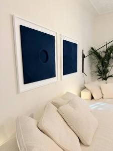 Elena Brovelli Portal artwork in SAG’80 showroom living interior with Maxalto furniture, Milano Design Week 2026