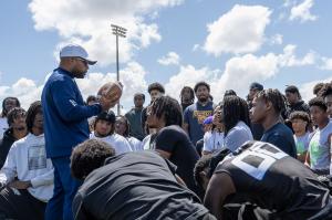 Image of HBCU Football coach inspiring student athletes