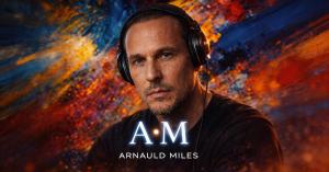 Arnauld Miles, international music artist and producer, portrait with studio headphones.