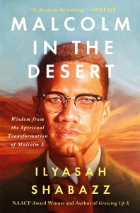This image displays the cover of Dr. Ilyasah Shabazz's new book, Malcolm in the Desert. On the cover, Malcolm X stares directly at readers, and is flanked by watercolor sand dunes.