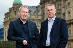Dave Kelly, CEO of 2i and Neil Kennedy, General Manager at Planit UK