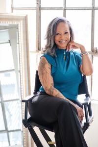 August is National Wellness Month, and the timing lands hard arecia hester smiling as a personal development coach
