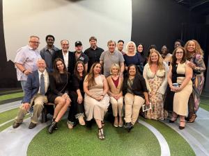 Alycia Kaback, Co-Founder of VIP Ignite, poses with legendary actors Dan Lauria and Patty McCormack alongside a large group of VIP Ignite talent in a professional studio setting in Los Angeles, showcasing the caliber of working industry professionals that