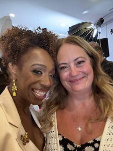 Deneen White, President of Talent Development at VIP Ignite, and bestselling author and transformational speaker Lisa Nichols smile warmly together as co-authors of the forthcoming book Relentless, reflecting the powerful partnership between two faith-dri