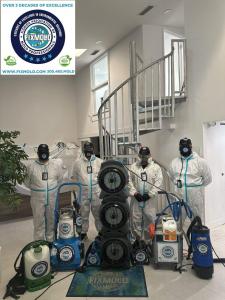 Fix Mold technicians with air quality test, mold abatement and mold remediation equipment for North Miami Beach properties.
