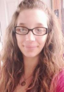 “Author Kristen A. Peters smiling in a professional portrait.”