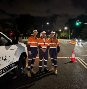 Black Label Traffic controllers managing traffic during roadworks at Sydney construction site