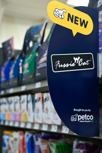 Signage at Petco store announcing Fussie Cat now available
