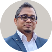 A colour head and shoulders portrait of Abhijit Sengupta, CEO and Founder of BrandLaunchX