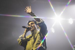 Anuv Jain singing on stage during his Boston concert at Big Night Live on the Dastakhat World Tour 2026, holding a microphone under bright concert lights during the sold out Anuv Jain North American Tour.