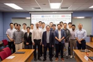 OPAL-RT Technologies and The Hong Kong Polytechnic University teams posing during memorandum of understanding signing ceremony for power systems and grid modernization research partnership.