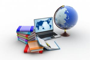 photo of a globe and books