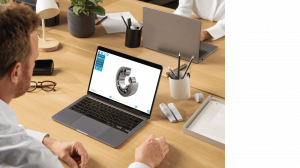 saVRee has released new specialist training modules covering boiler systems, transformer construction and testing, and electrical protection schemes Man at an office desk viewing an interactive 3D cutaway model of a ball bearing on his laptop using the saVRee learning platform.