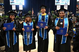 Group of Students at ASU Commencement with Degrees