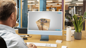 Man at an office desk viewing an interactive 3D cross-section model of a geothermal energy system on his desktop computer using the saVRee learning platform.