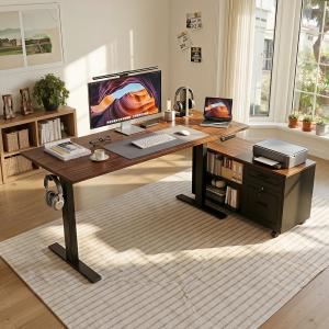 Modern height adjustable standing desk with movable file cabinet, monitor setup, and modular workspace design in a bright home office.