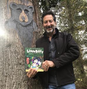 Free General Admission, Special Guest Appearances & Ambassador Animal from Tamerlaine Sanctuary & Preserve for June 15 Performance Author Barry Farber stands beside a tree carving of Bosco the Bear he made while holding a copy of The Adventures of Little Billy: In Search of the Magic Tree outdoors.