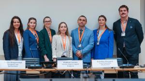 In the center: Mariia Anapreichyk and Vladimir Ivanov, experts of the ALLATRA Global Research Center, at the OSCE Human Dimension Meeting, Vienna