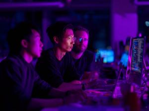 QScout cybersecurity analysts reviewing code, attack surfaces, and cryptographic risk indicators