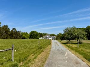  4 BR/6 BA home w/horse barn, fencing, detached work shop, garage and  storage buildings on 30.8 +/- Acres in Halifax County, VA