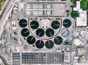Droplet-based electricity generator system for harvesting wastewater energy