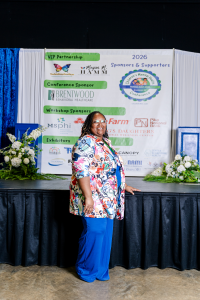 Hamm, Conference Host standing on stage